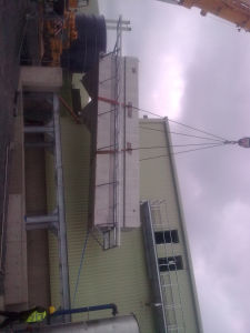 Stainless-steel-DAF-tank-being-lifted-into-place-alpha-tanks