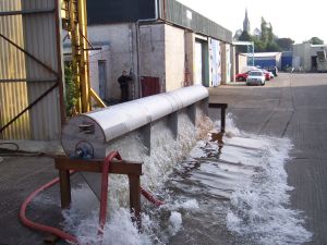 Testing-stainless-steel-tipping- Buckets-alpha-tanks